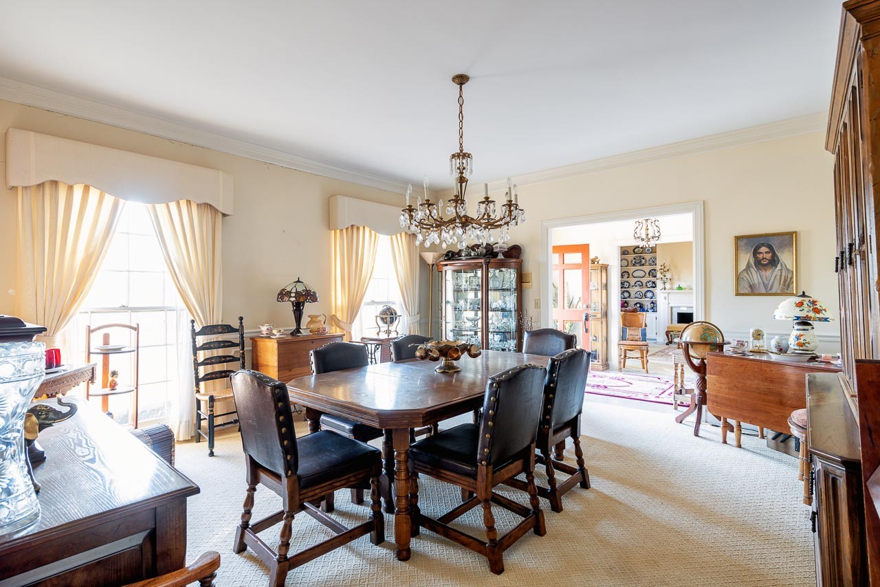 4832 Murfreesboro Road Arrington, TN 37014 - Photo 7 of 70 a dining room with furniture a chandelier and window