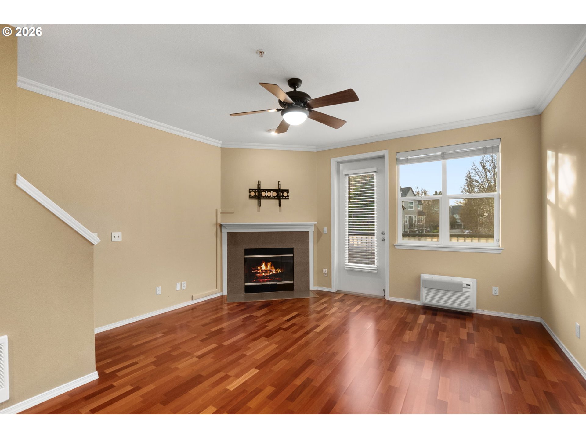 1814 Southeast Cutter Lane Vancouver, WA 98661 - Photo 5 of 40 a view of empty room with wooden floor and fan