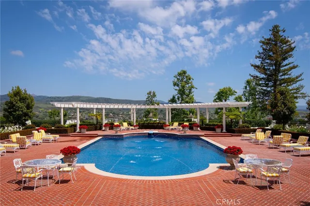 a outdoor space with pool and furniture