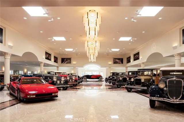 a room with lots of cars parked