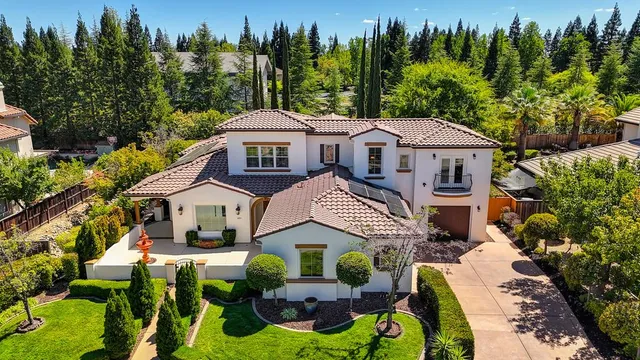 a aerial view of a house with garden