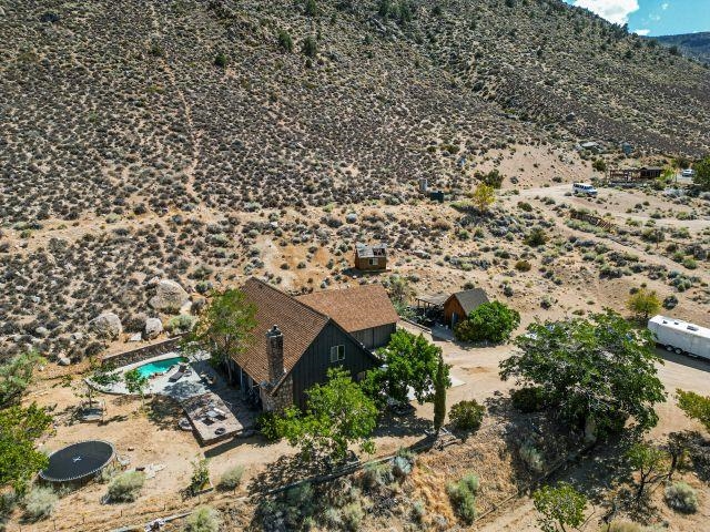 57 Bir Road, Unit 1 Bishop, CA 93514 - Photo 33 of 35 an aerial view of house with yard and car parked