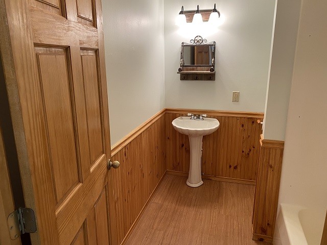 398 Azbill Road Lexington, TN 38351 - Photo 11 of 40 a bathroom with a sink and a mirror