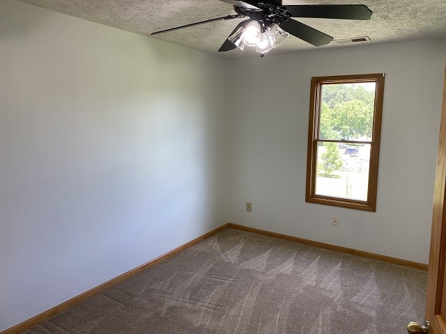 398 Azbill Road Lexington, TN 38351 - Photo 14 of 40 an empty room with a window