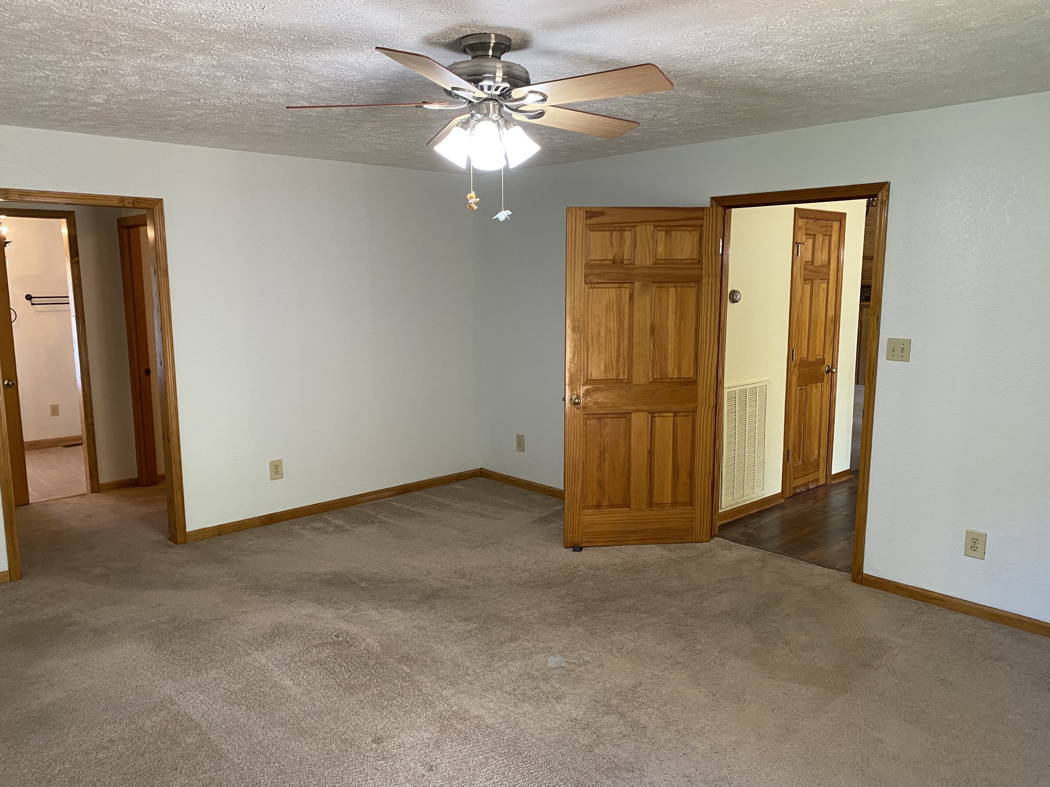 398 Azbill Road Lexington, TN 38351 - Photo 17 of 40 an empty room with windows ceiling fan