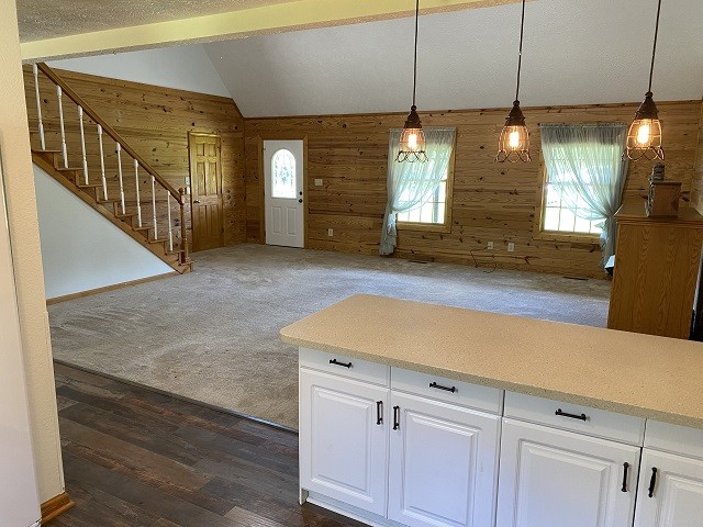 398 Azbill Road Lexington, TN 38351 - Photo 4 of 40 a view of a kitchen with a ceiling fan and wooden floor
