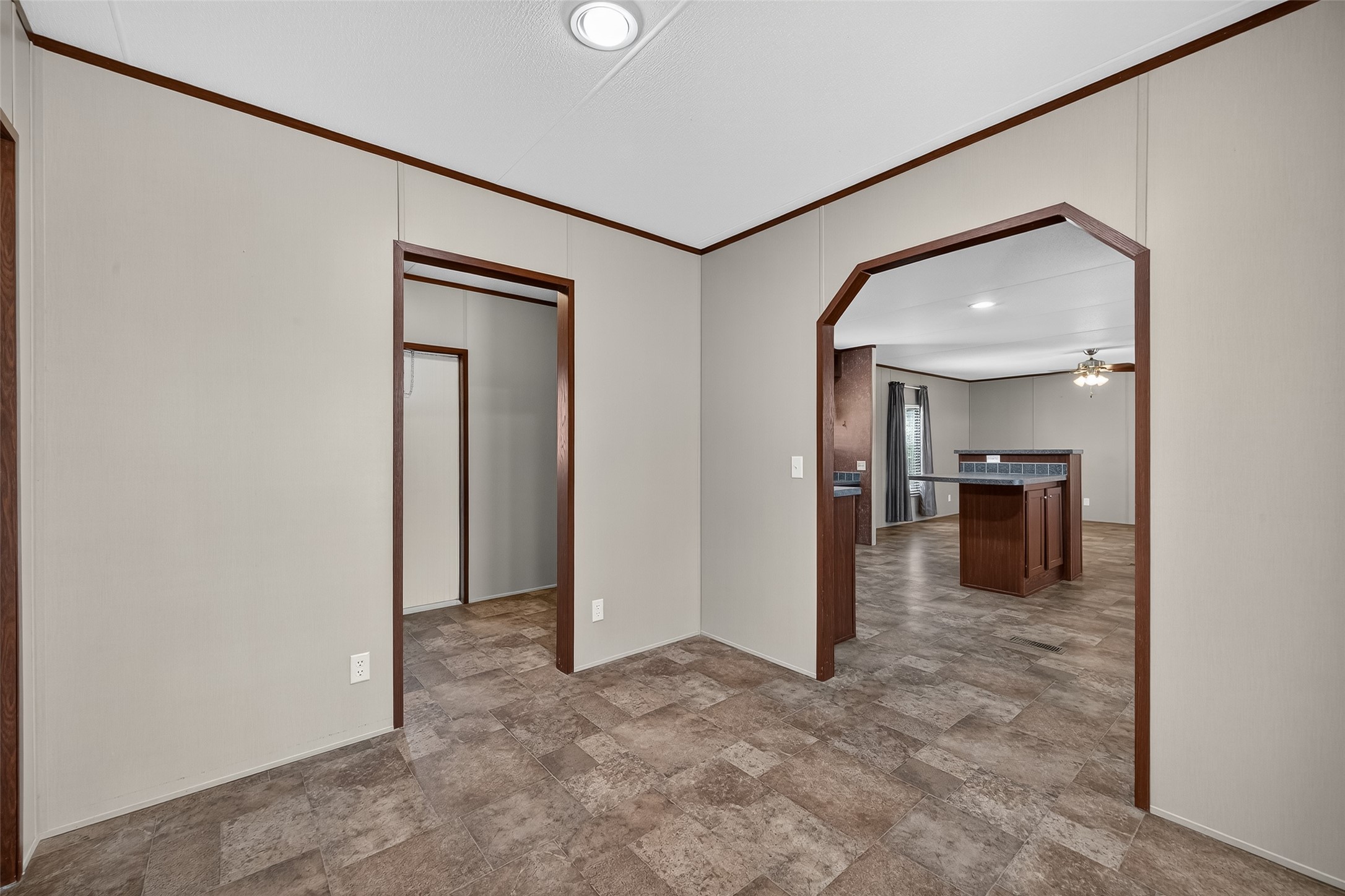 13411 Zamanek Road Needville, TX 77461 - Photo 23 of 40 a view of a hallway with a livingroom and a bathroom