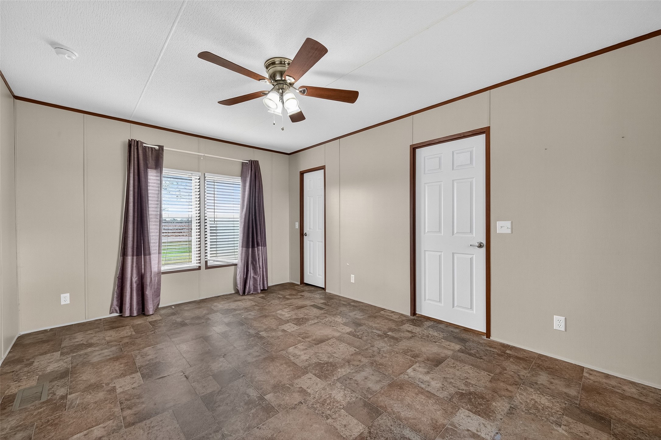 13411 Zamanek Road Needville, TX 77461 - Photo 33 of 40 a view of a livingroom with a ceiling fan and window