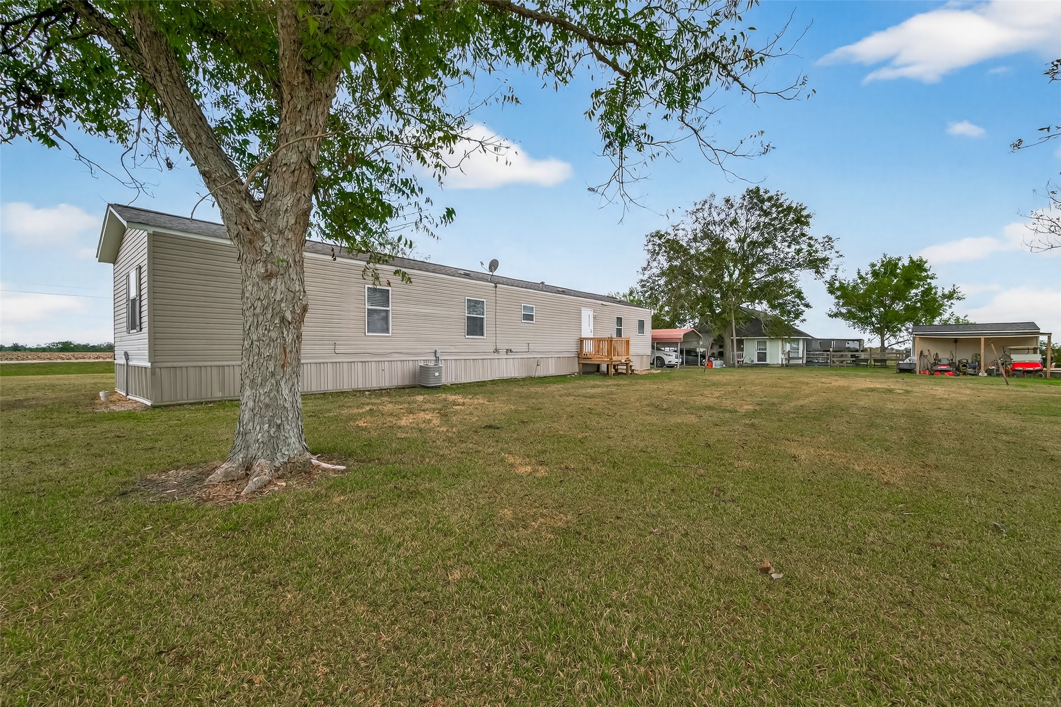 13411 Zamanek Road Needville, TX 77461 - Photo 38 of 40 a view of a house with a yard