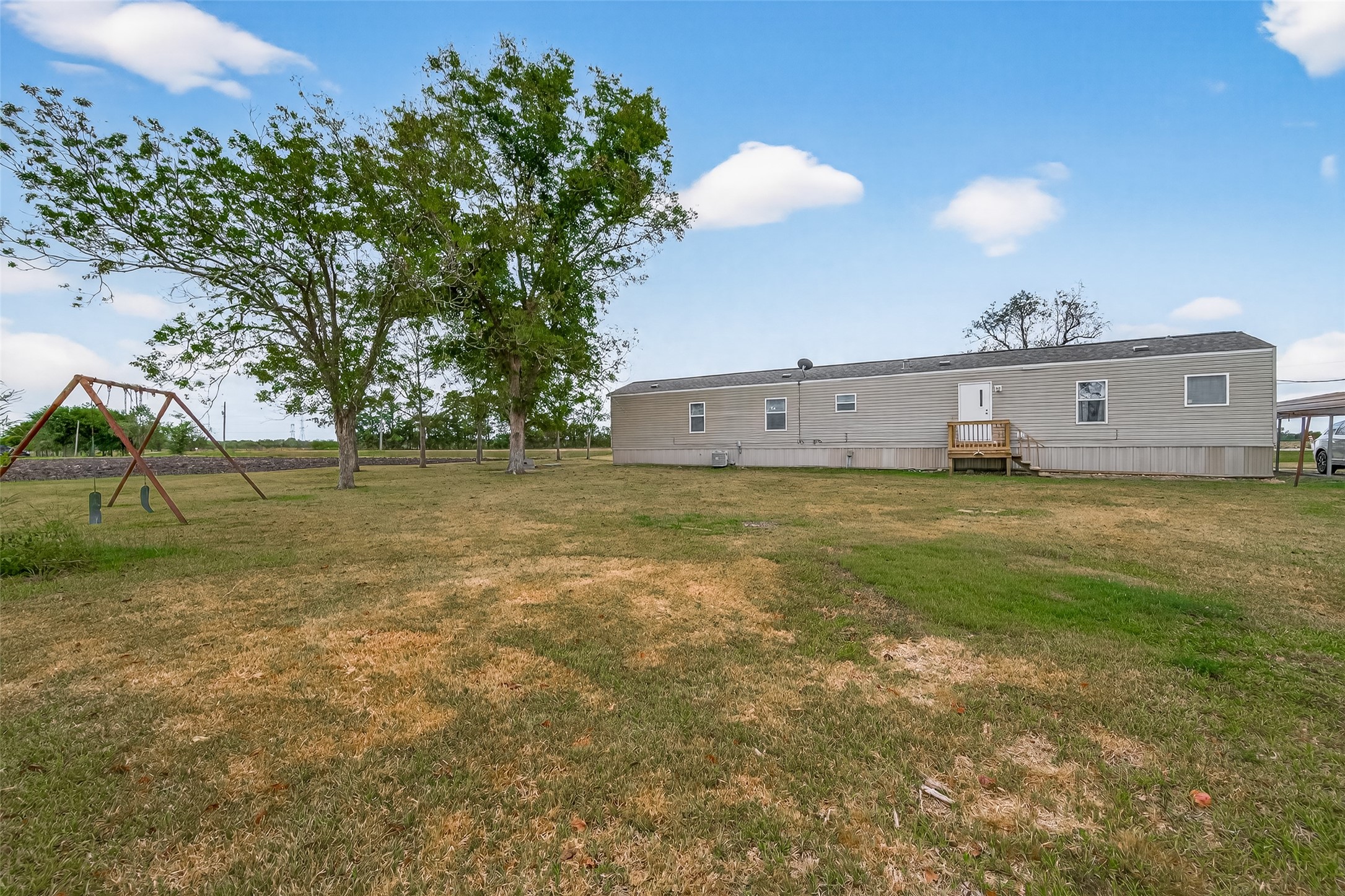 13411 Zamanek Road Needville, TX 77461 - Photo 40 of 40 a view of a house with a yard