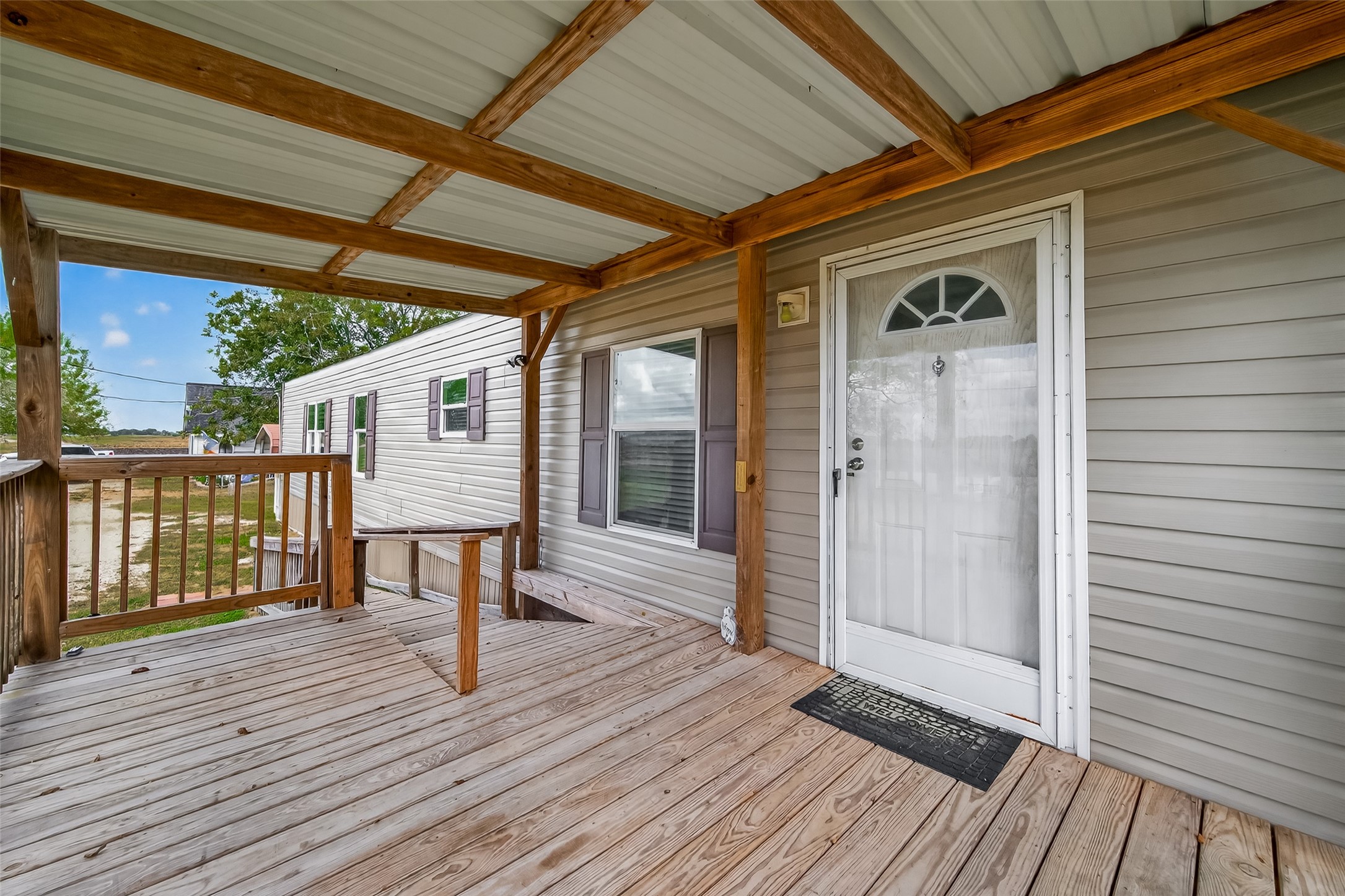 13411 Zamanek Road Needville, TX 77461 - Photo 6 of 40 a porch with seating space