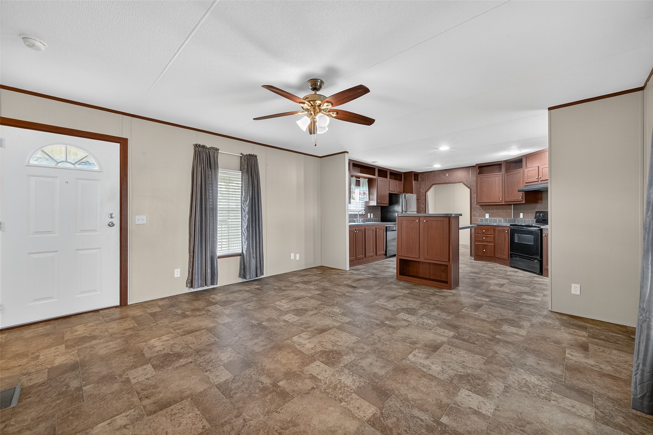13411 Zamanek Road Needville, TX 77461 - Photo 9 of 40 a view of a kitchen with a stove cabinets and a kitchen
