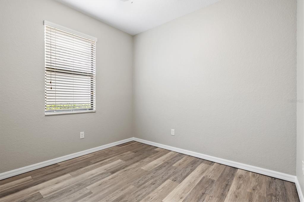 17030 Blue Ridge Place Bradenton, FL 34211 - Photo 32 of 65 an empty room with a window