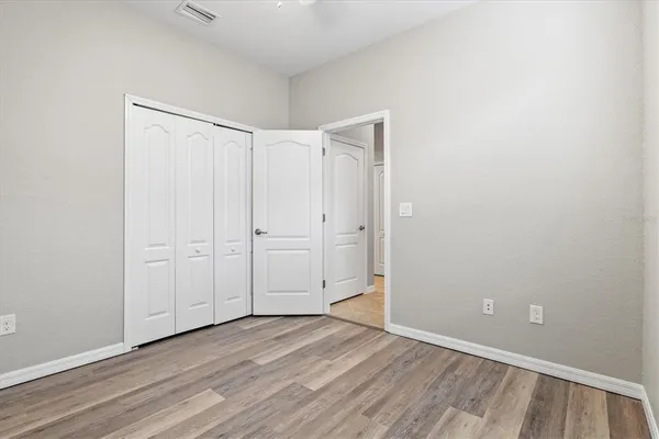 a dining room with a table and chairs