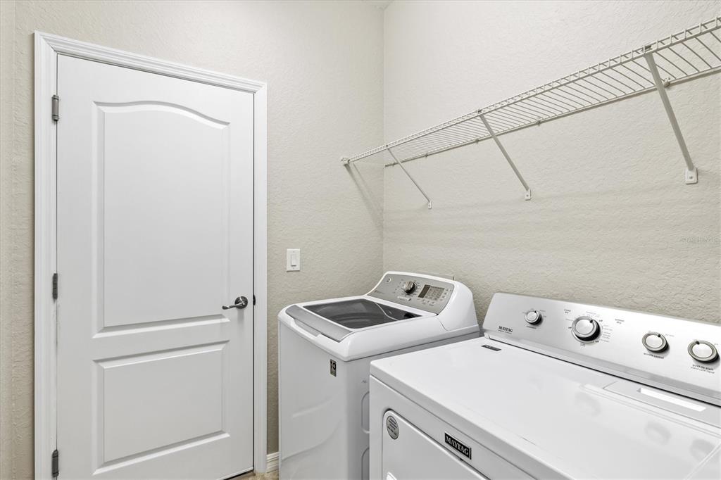 17030 Blue Ridge Place Bradenton, FL 34211 - Photo 35 of 65 a utility room with dryer and washer