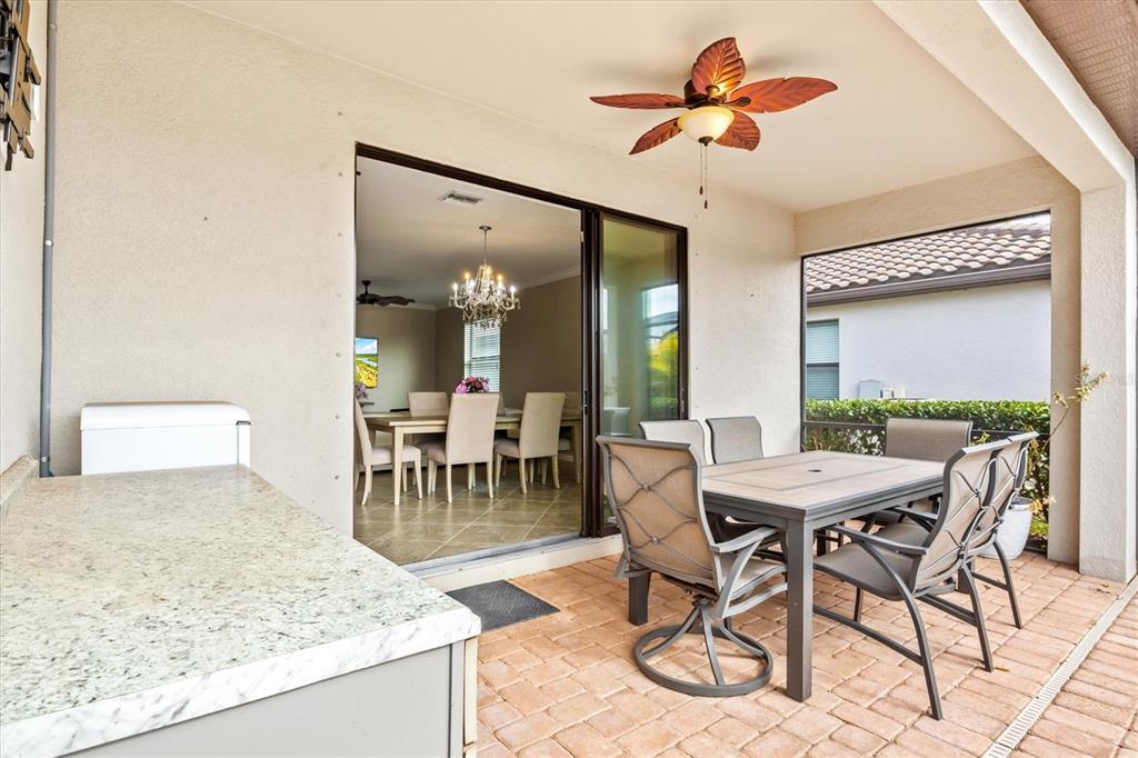 17030 Blue Ridge Place Bradenton, FL 34211 - Photo 38 of 65 a view of a dining room with furniture