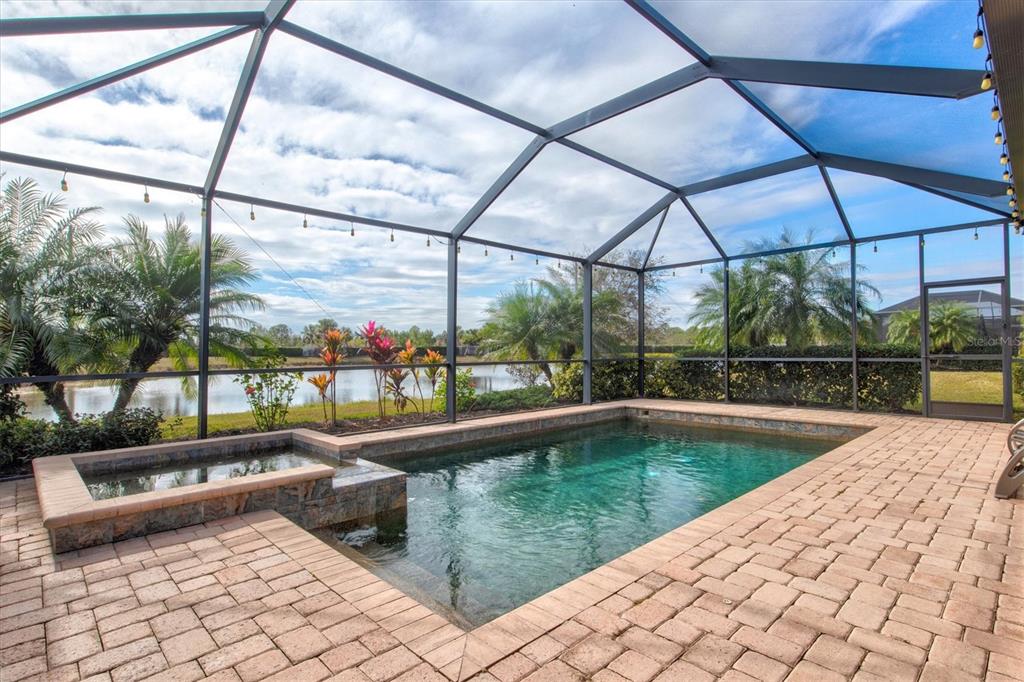 17030 Blue Ridge Place Bradenton, FL 34211 - Photo 42 of 65 a view of swimming pool with a couches in patio