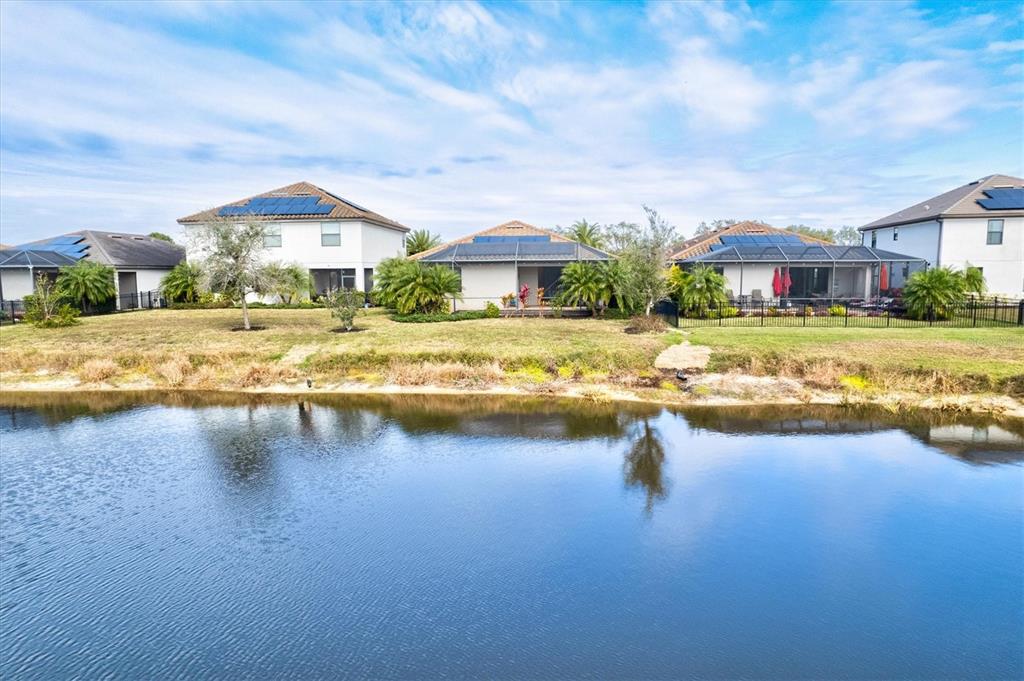 17030 Blue Ridge Place Bradenton, FL 34211 - Photo 53 of 65 a view of an ocean & house with swimming pool and outdoor space