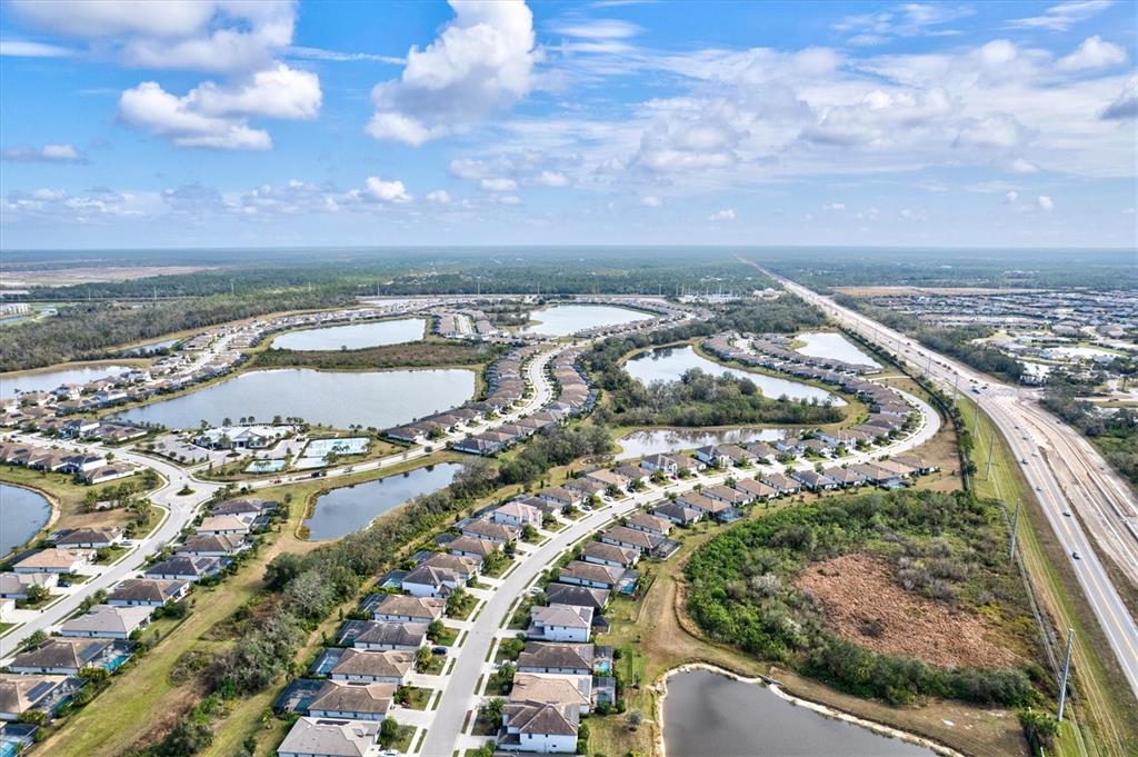 17030 Blue Ridge Place Bradenton, FL 34211 - Photo 59 of 65 an aerial view of a city