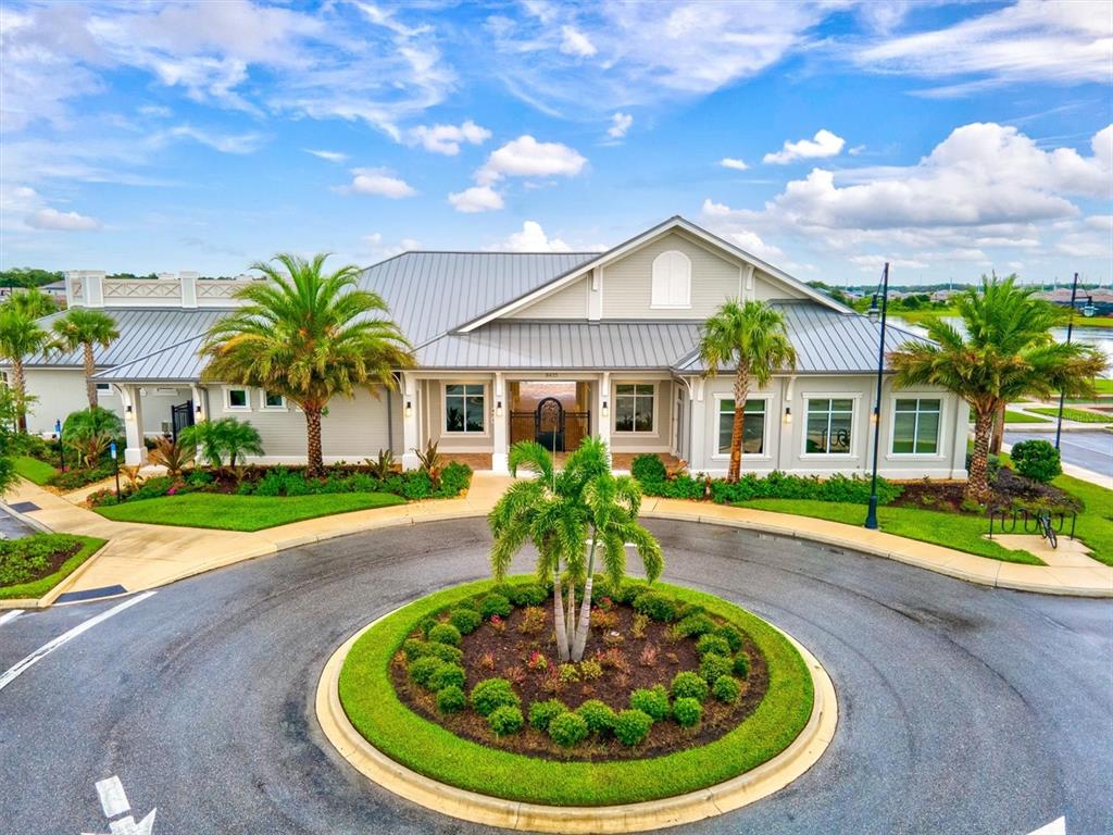 17030 Blue Ridge Place Bradenton, FL 34211 - Photo 60 of 65 a view of a house with a swimming pool and porch