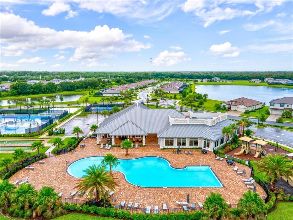 17030 Blue Ridge Place Bradenton, FL 34211 - Photo 64 of 65 an aerial view of a house with a garden