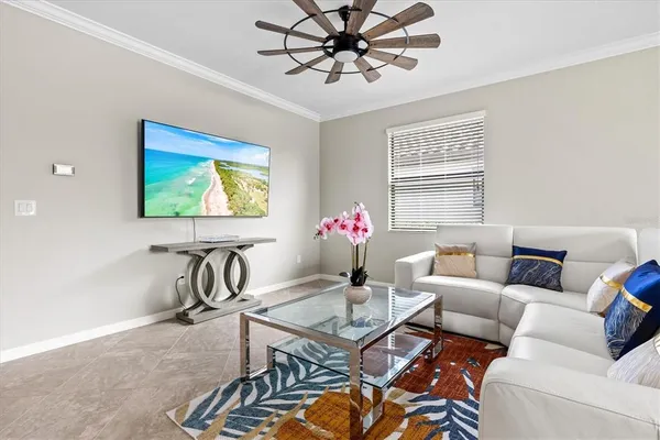 a living room with furniture and a window