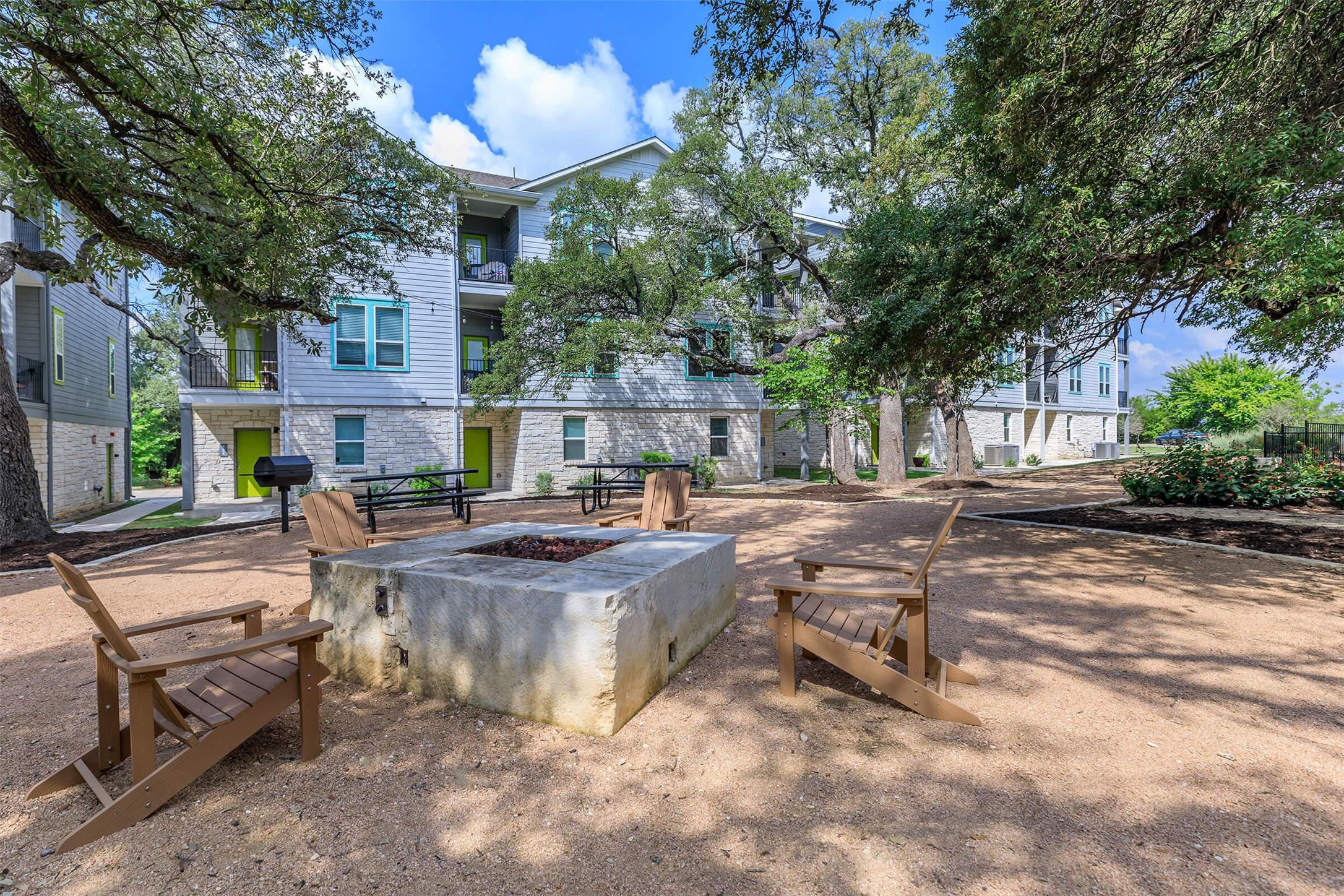 428 Ozark Trail Leander, TX 78641 - Photo 24 of 27 a view of a patio with table and chairs and potted plants