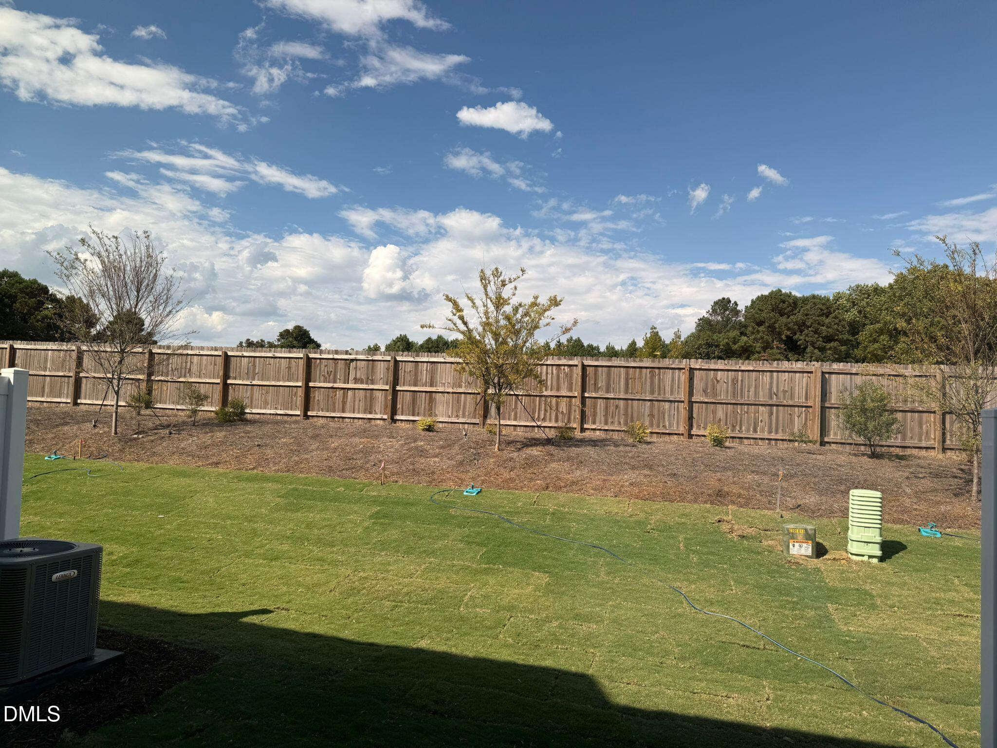 66 Bloodroot Street Angier, NC 27501 - Photo 8 of 16 a view of a garden