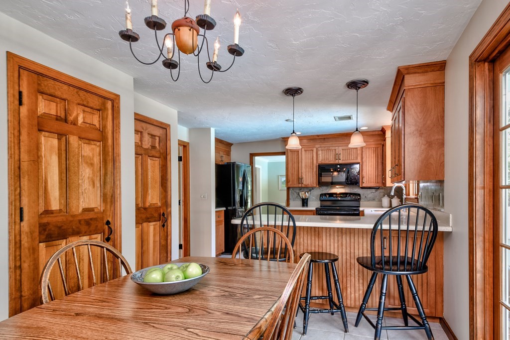 6 Dale Road Hopkinton, MA 01748 - Photo 12 of 39 a view of a dining room with furniture window and wooden floor