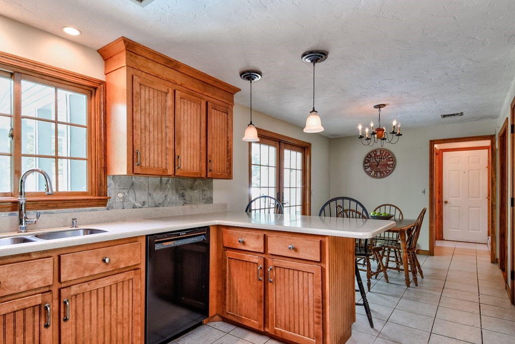 6 Dale Road Hopkinton, MA 01748 - Photo 15 of 39 a kitchen with granite countertop a sink and dishwasher