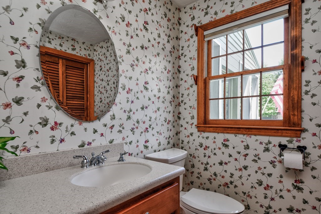 6 Dale Road Hopkinton, MA 01748 - Photo 21 of 39 a bathroom with a sink a toilet and a mirror