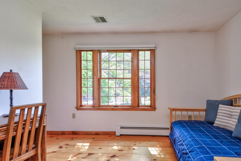 6 Dale Road Hopkinton, MA 01748 - Photo 23 of 39 a living room with furniture and a window
