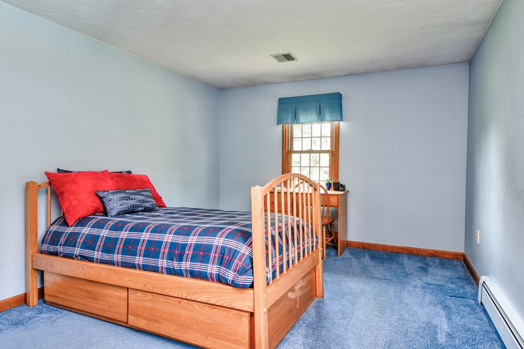 6 Dale Road Hopkinton, MA 01748 - Photo 25 of 39 a bedroom with two beds and a window
