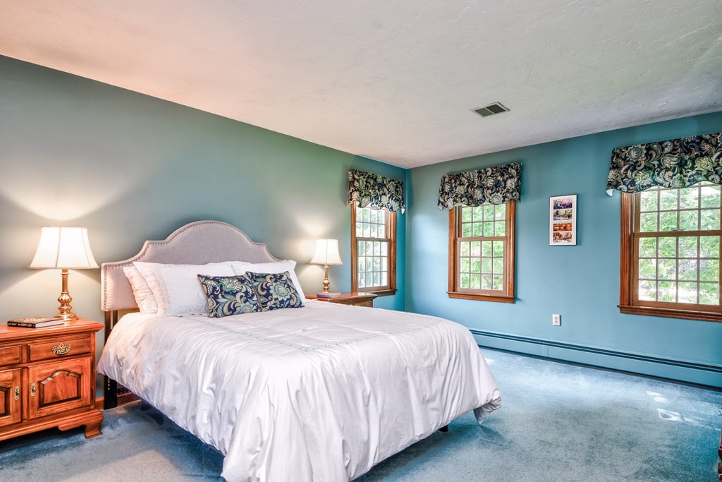 6 Dale Road Hopkinton, MA 01748 - Photo 27 of 39 a spacious bedroom with a bed and a window