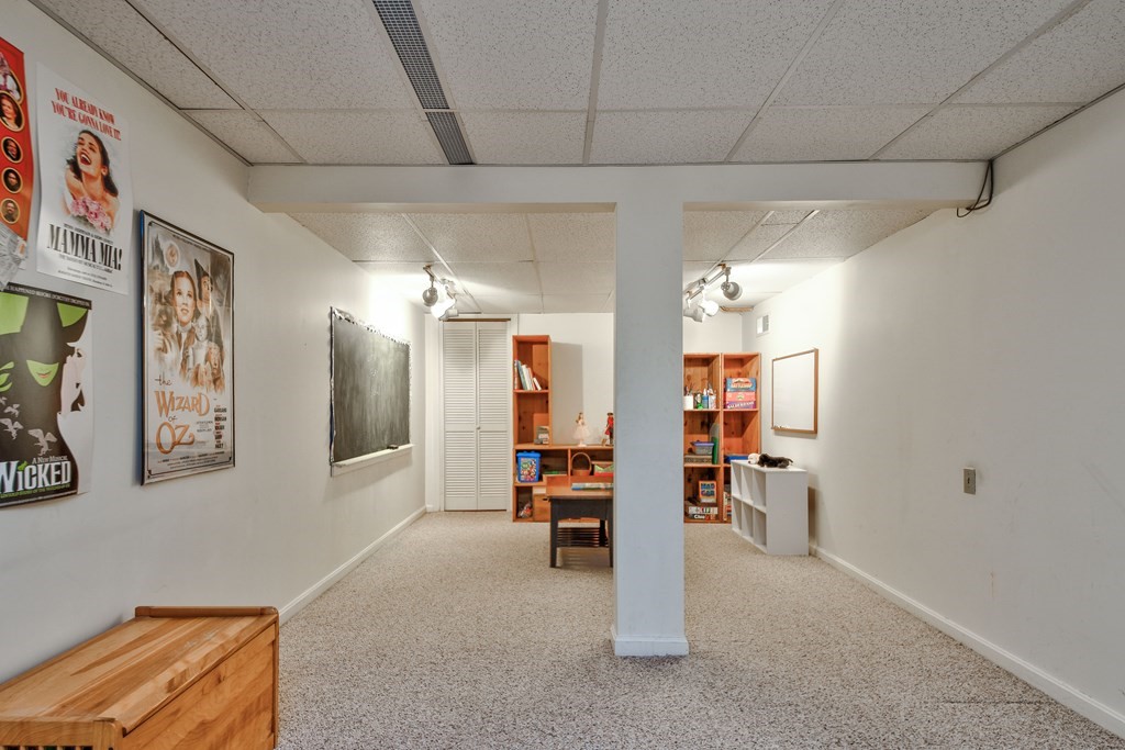 6 Dale Road Hopkinton, MA 01748 - Photo 31 of 39 a view of a livingroom with furniture and a livingroom