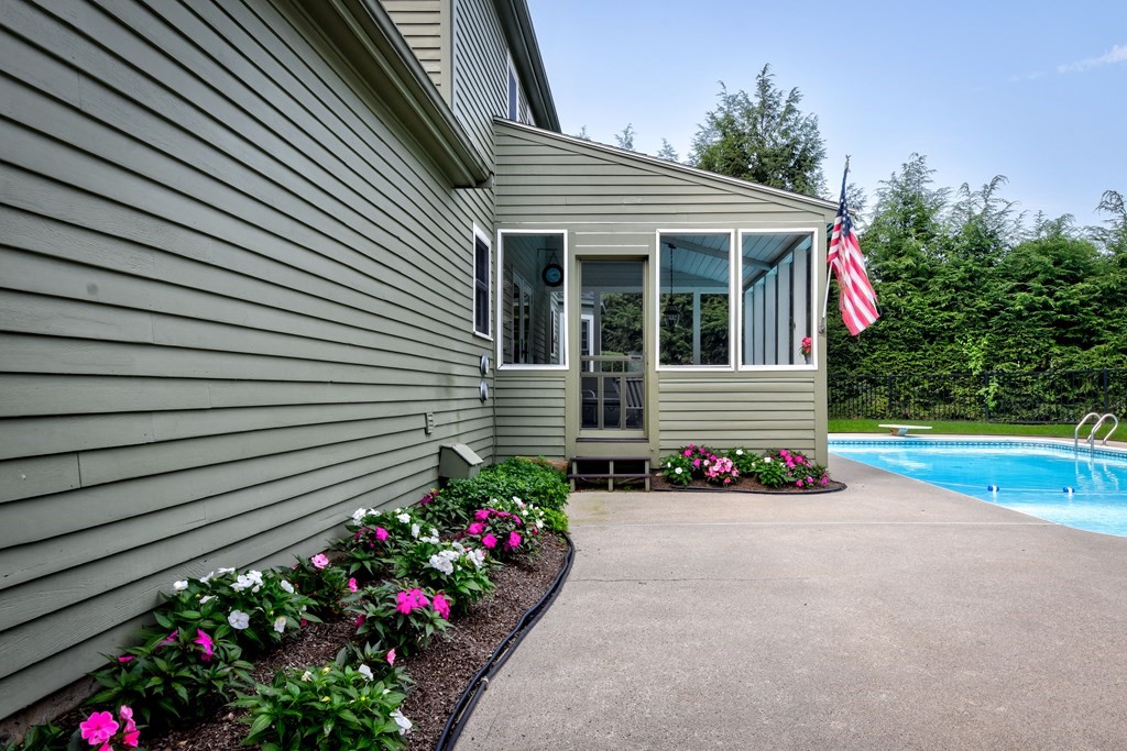 6 Dale Road Hopkinton, MA 01748 - Photo 34 of 39 a view of flower garden in front of a house