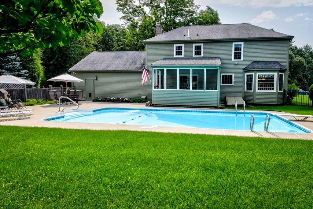 6 Dale Road Hopkinton, MA 01748 - Photo 36 of 39 a view of a house with a swimming pool and a yard