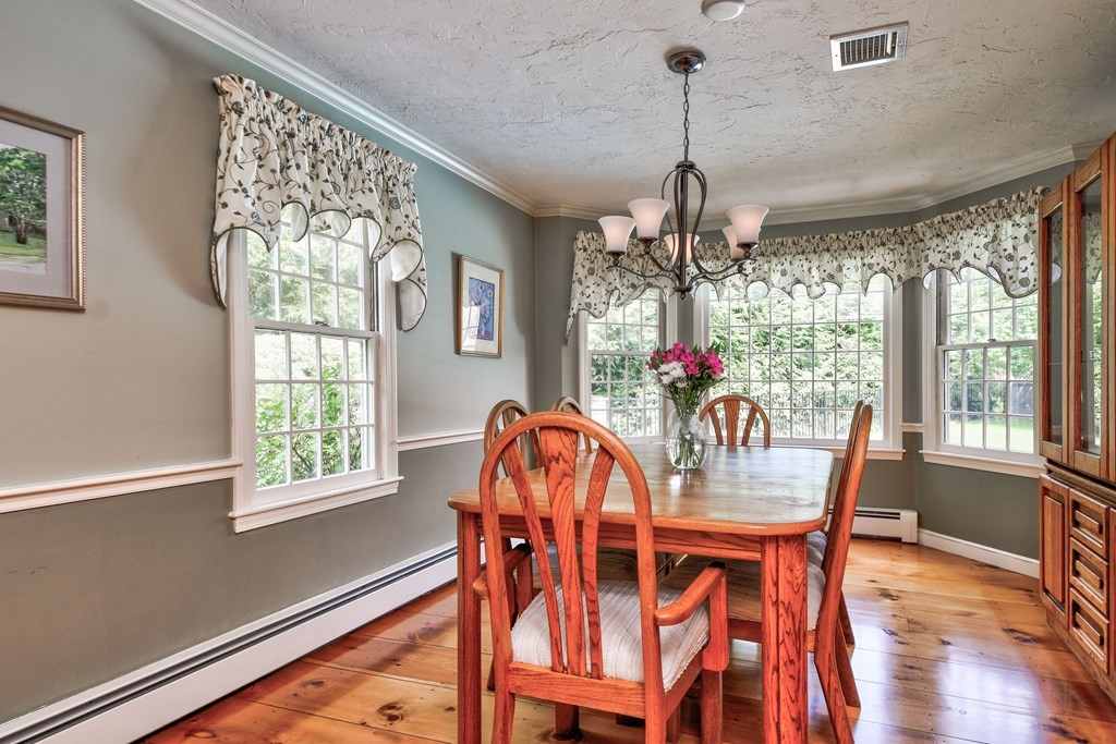 6 Dale Road Hopkinton, MA 01748 - Photo 7 of 39 a dining room with furniture a chandelier and wooden floor