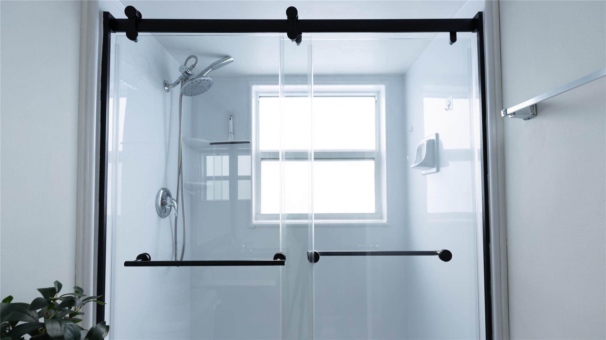 3100 North Course Lane, Unit 510 Pompano Beach, FL 33069 - Photo 18 of 21 a bathroom with a window and a shower