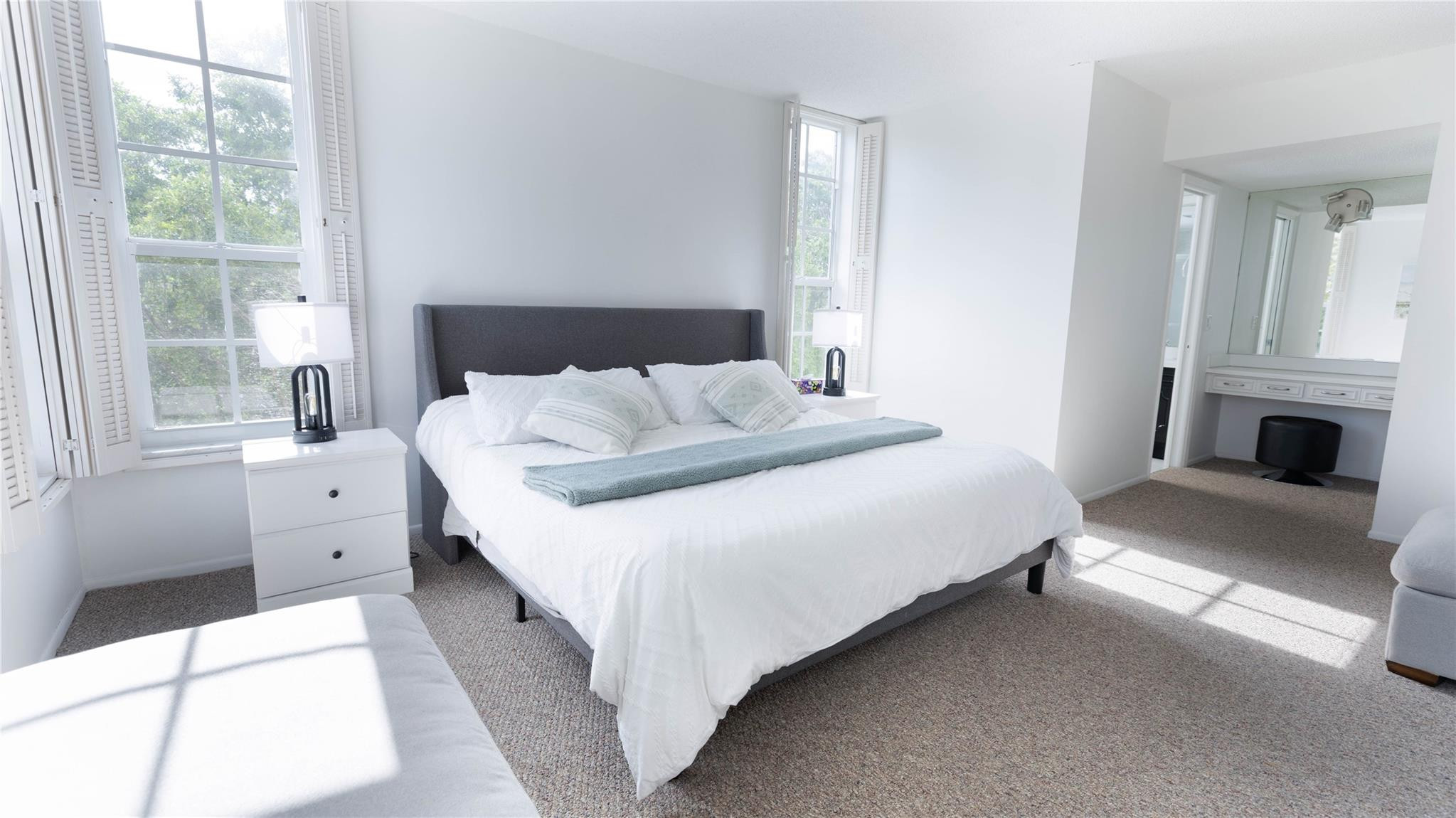 3100 North Course Lane, Unit 510 Pompano Beach, FL 33069 - Photo 10 of 21 a bedroom with a bed and a fireplace