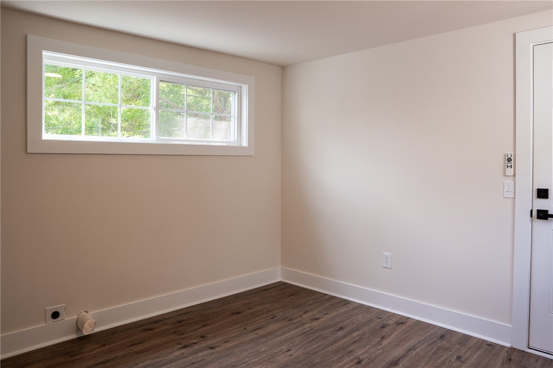 1312 Rocky Brook Road Opelika, AL 36801 - Photo 29 of 45 This versatile room features durable flooring and ample natural light, ideal for various uses.