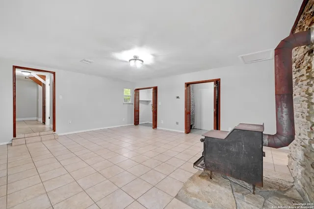 a view of livingroom with furniture and window