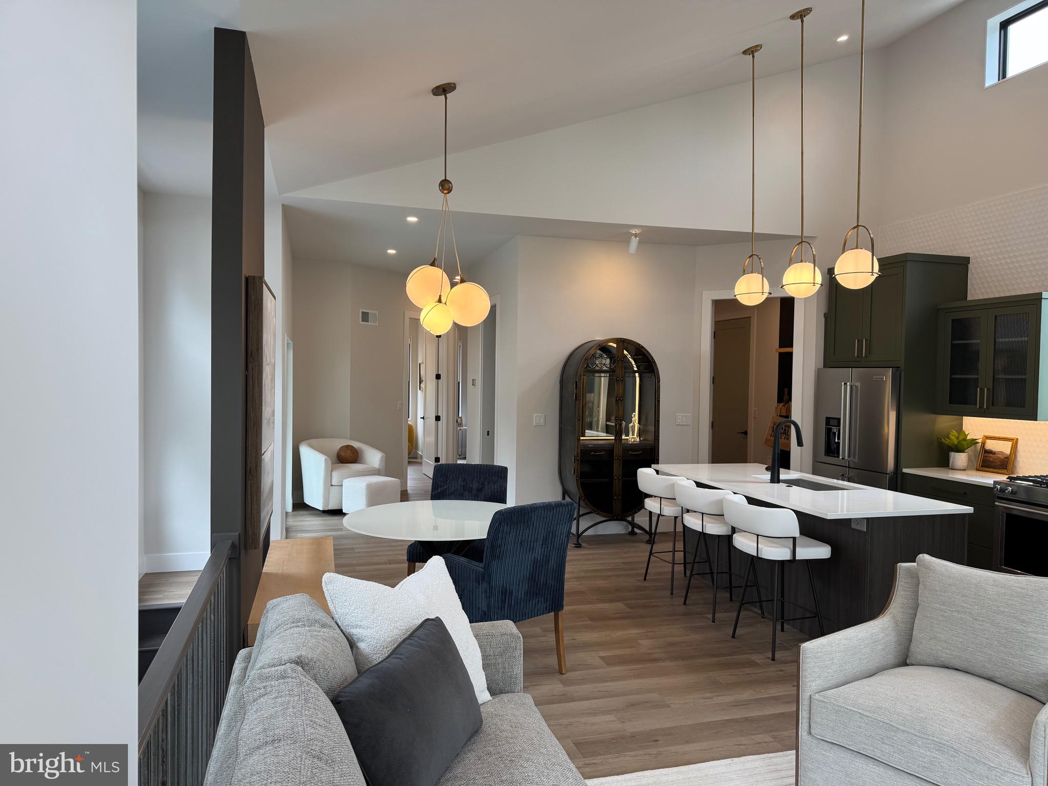 256 South Cedar Street Lititz, PA 17543 - Photo 6 of 25 a dining room with furniture a chandelier and kitchen view