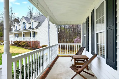 a view of a two chair in the balcony