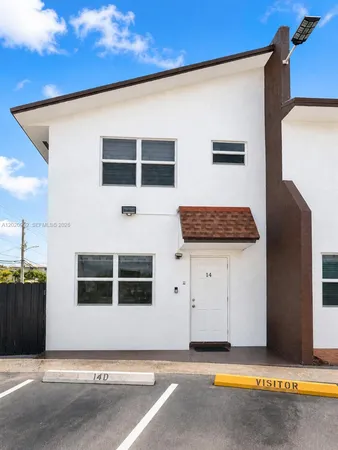 a front view of a house with windows