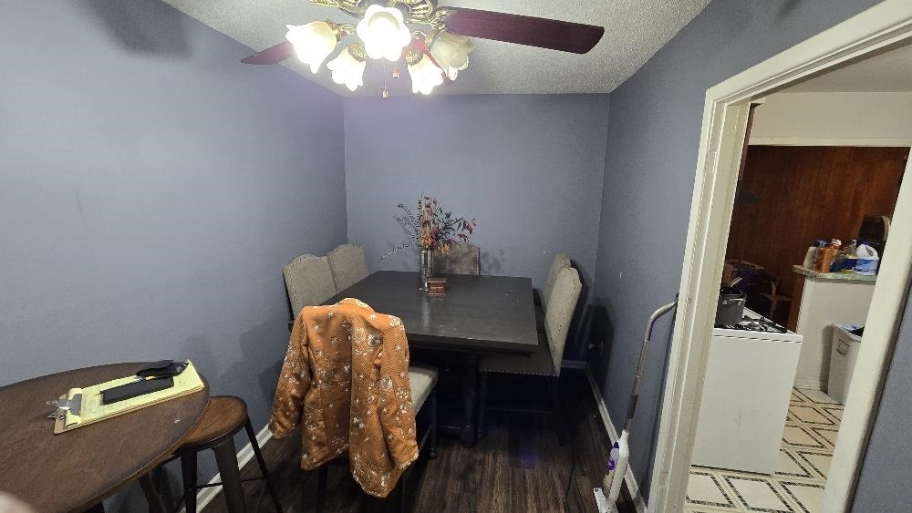 3162 Ford Road Memphis, TN 38109 - Photo 14 of 17 a workspace with furniture and wooden floor