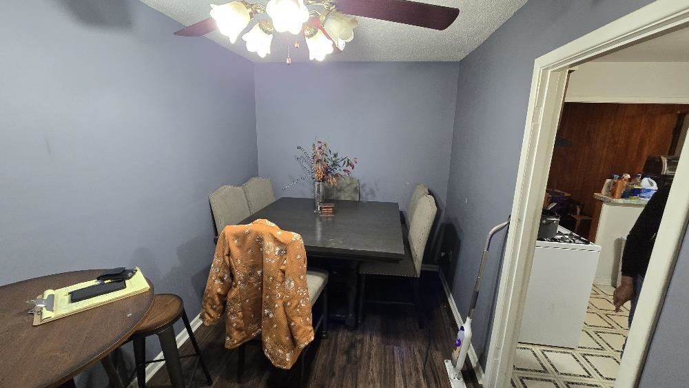 3162 Ford Road Memphis, TN 38109 - Photo 15 of 17 a workspace with furniture and wooden floor