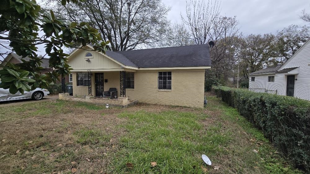 3162 Ford Road Memphis, TN 38109 - Photo 2 of 17 a view of a house with a yard