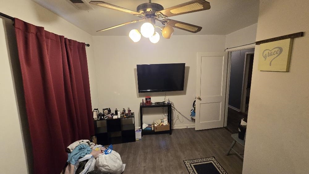 3162 Ford Road Memphis, TN 38109 - Photo 6 of 17 a living room with furniture and a flat screen tv