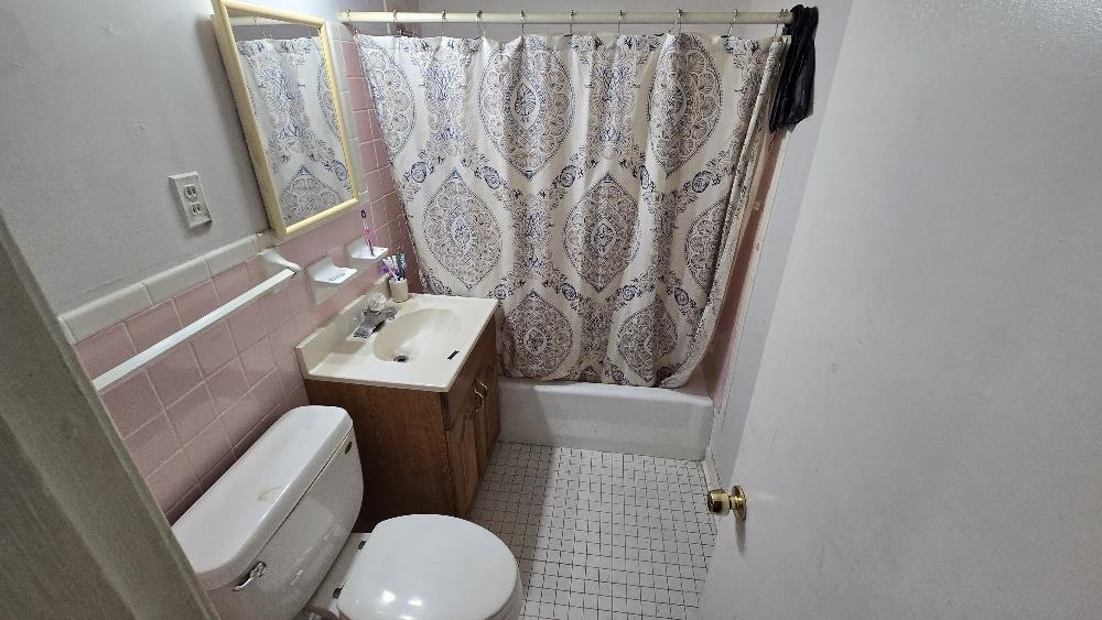 3162 Ford Road Memphis, TN 38109 - Photo 8 of 17 a bathroom with a sink and toilet